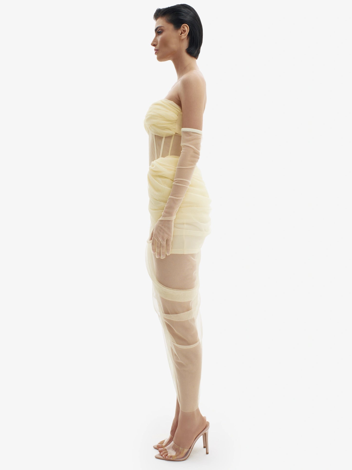 Pastel Yellow corset dress with beautiful draping, sensual structure, premium occasion wear.