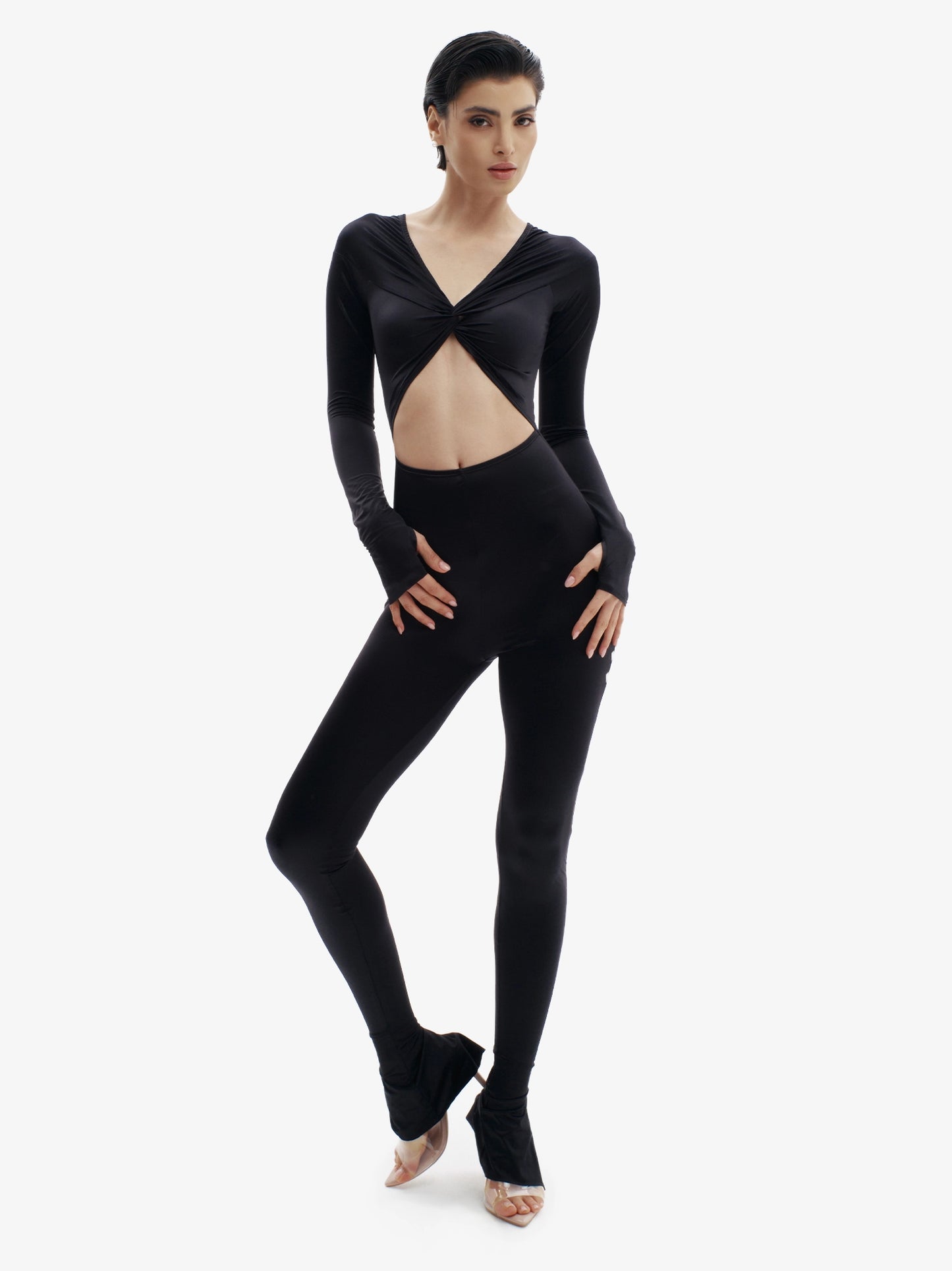 Black statement jumpsuit, unapologetic style, confident luxury fashion.