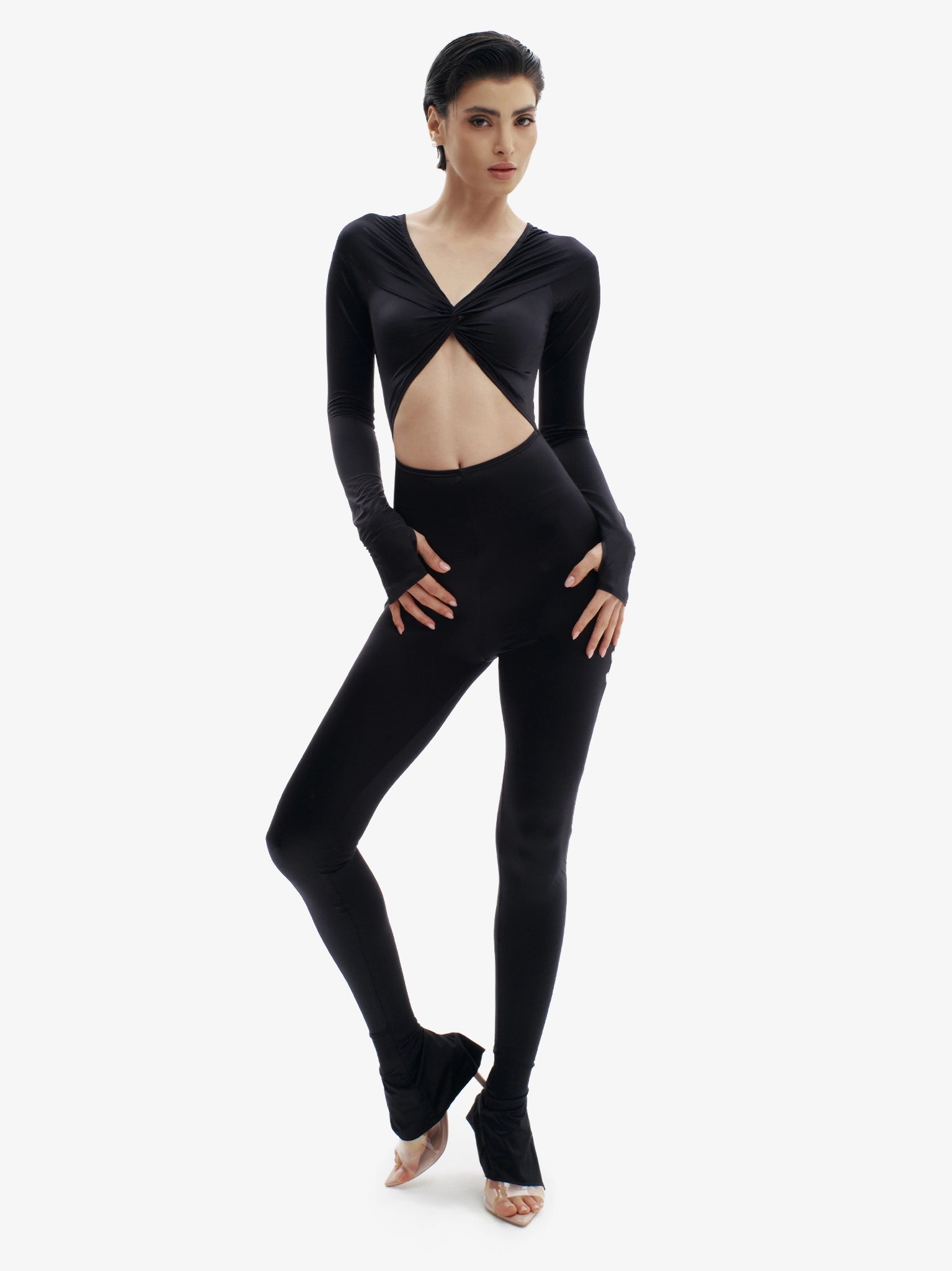 Black statement jumpsuit, unapologetic style, confident luxury fashion.