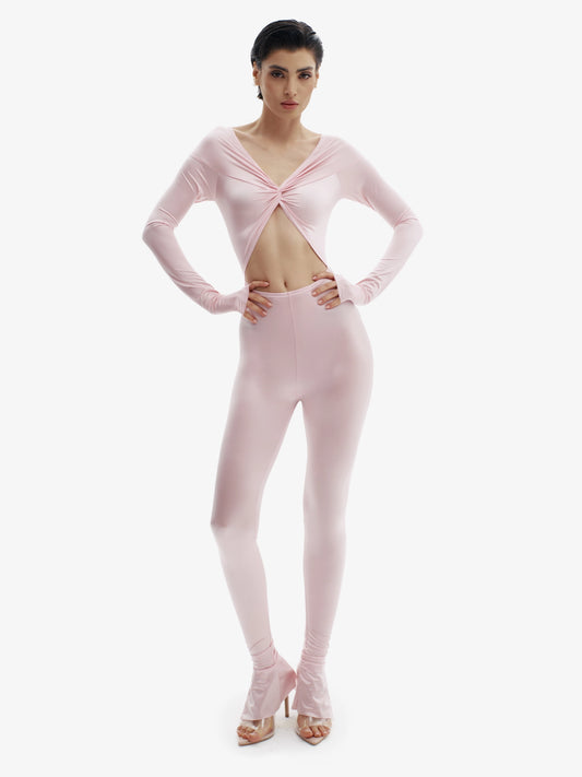 Pastel Pink statement jumpsuit, unapologetic style, confident luxury fashion.
