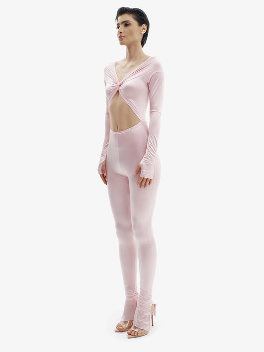 Pastel Pink statement jumpsuit, unapologetic style, confident luxury fashion.