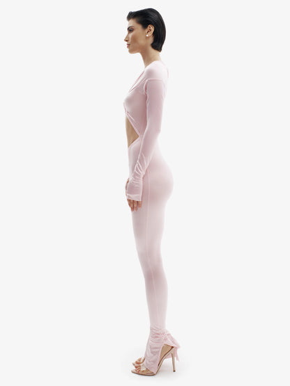 Pastel Pink statement jumpsuit, unapologetic style, confident luxury fashion.