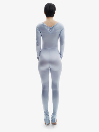 Pastel Blue statement jumpsuit, unapologetic style, confident luxury fashion.