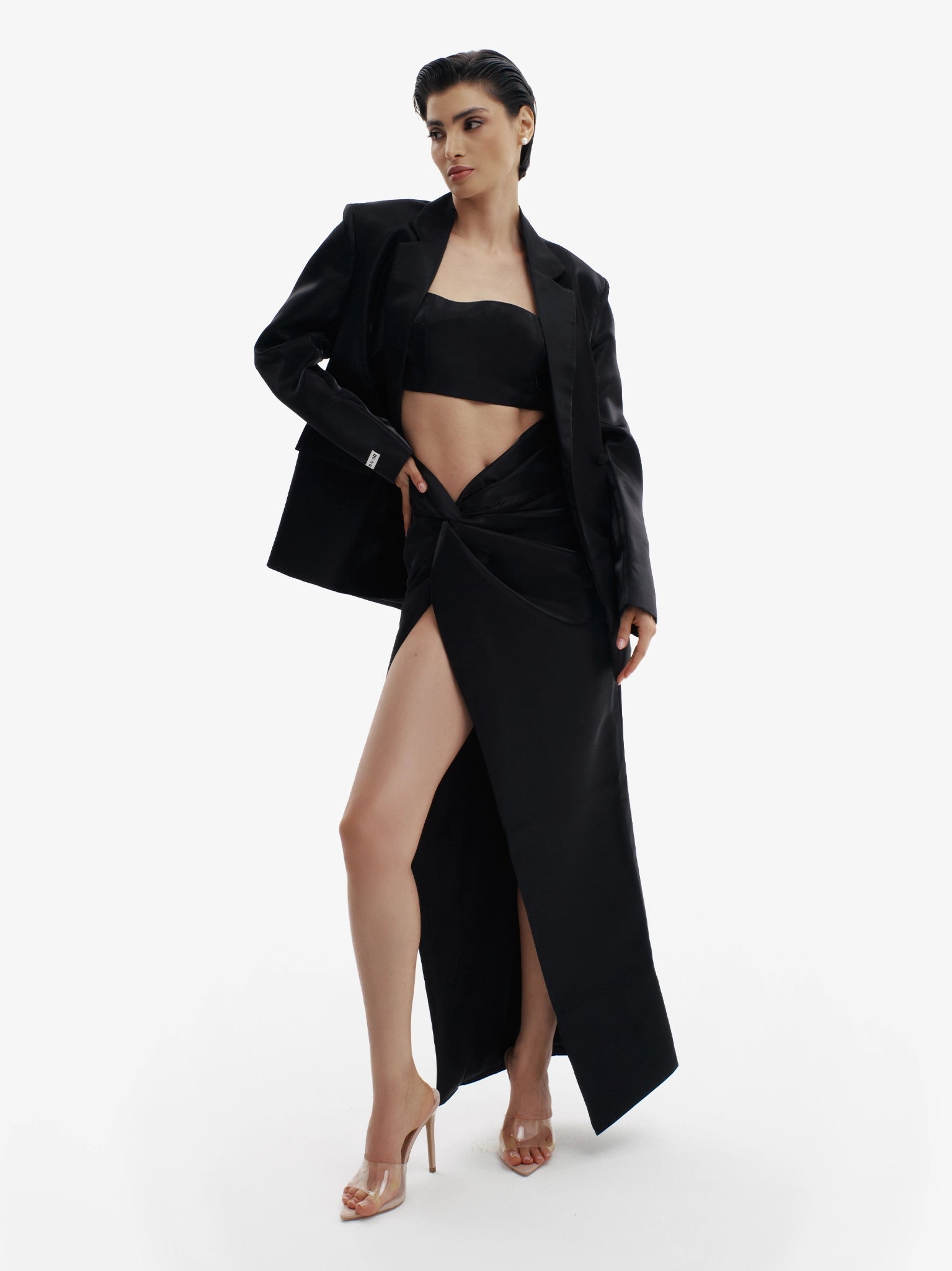 Liquid Black tailored liquid blazer, effortless sophistication, minimalist workwear chic.