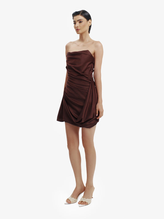 Brown statement mini dress, chic and daring, minimalist luxury party wear.