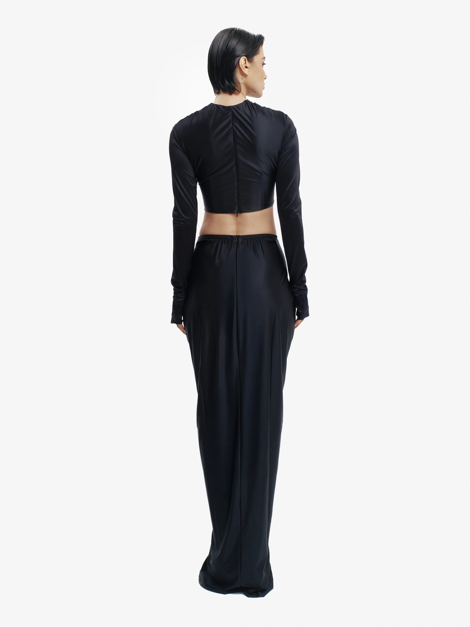 Black twisted knot maxi skirt, effortless draping, unique minimalist style.