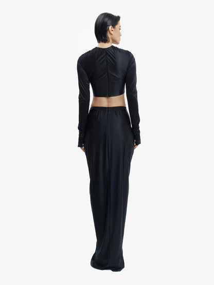 Black twisted knot maxi skirt, effortless draping, unique minimalist style.