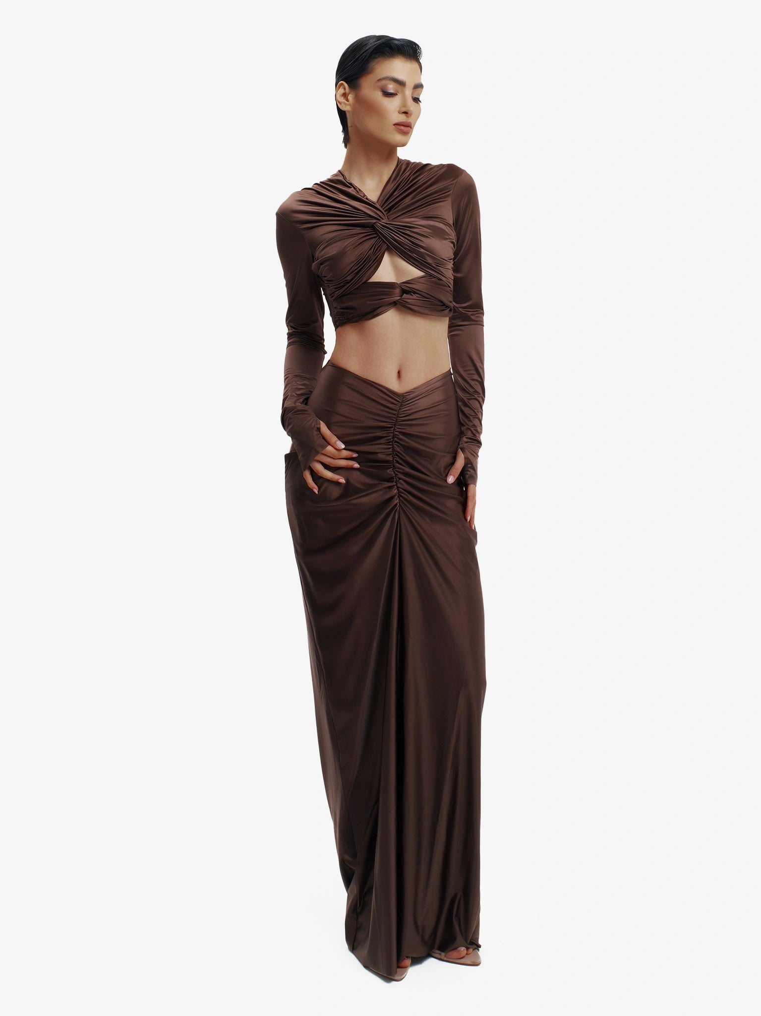 Brown twisted knot maxi skirt, effortless draping, unique minimalist style.