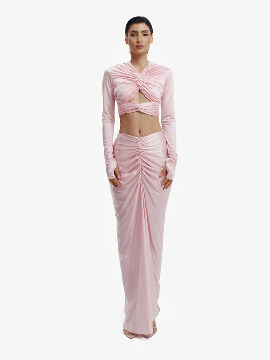 Pink twisted knot maxi skirt, effortless draping, unique minimalist style.