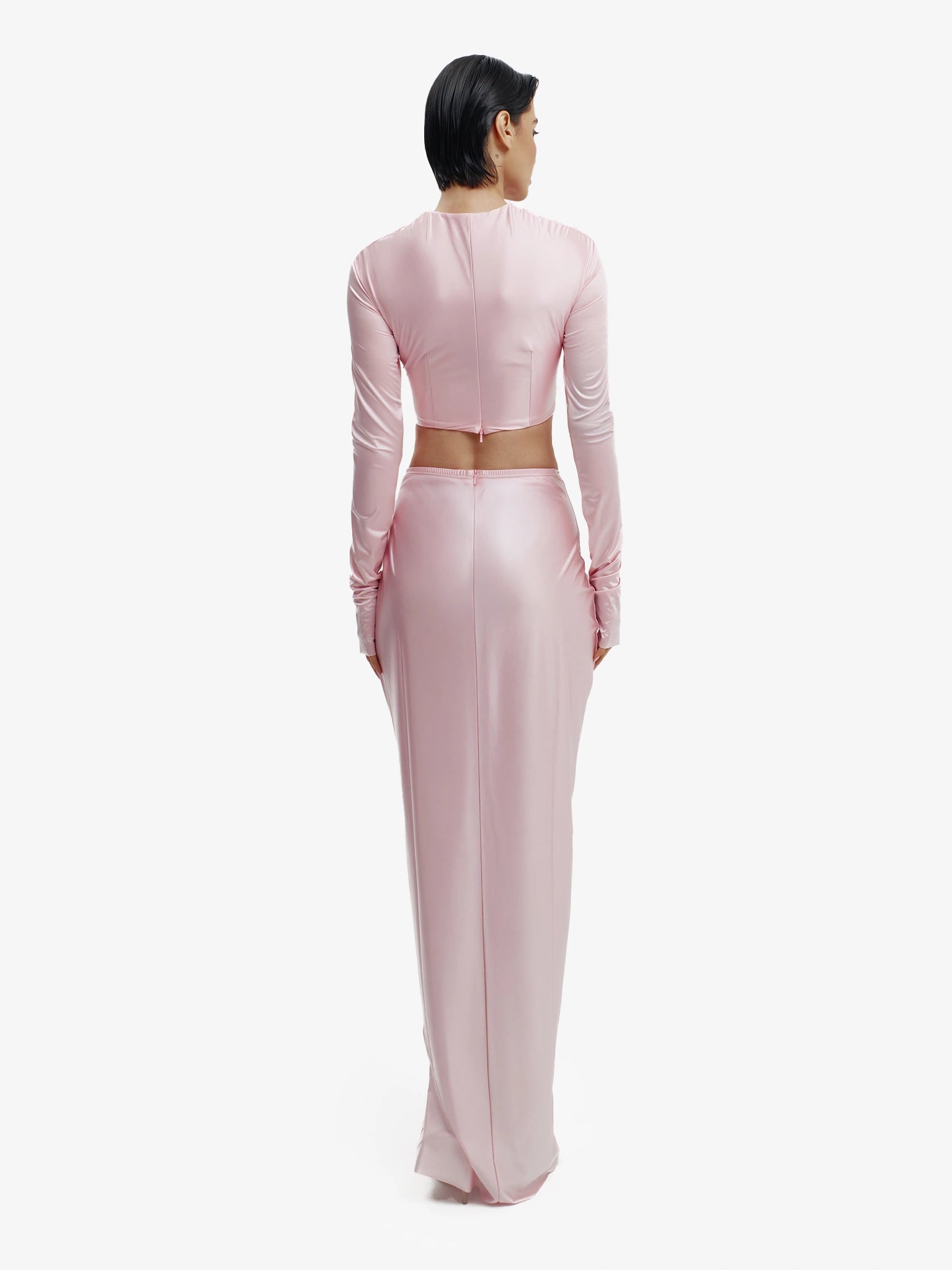 Pink twisted knot maxi skirt, effortless draping, unique minimalist style.