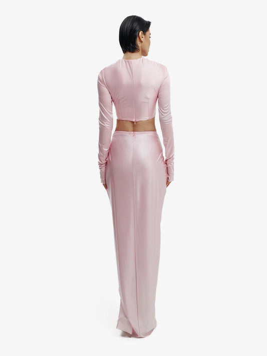 Pink twisted knot maxi skirt, effortless draping, unique minimalist style.