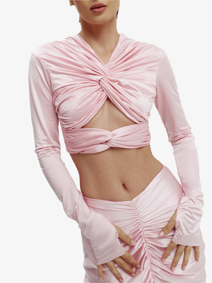 Pink twisted knot maxi skirt, effortless draping, unique minimalist style.