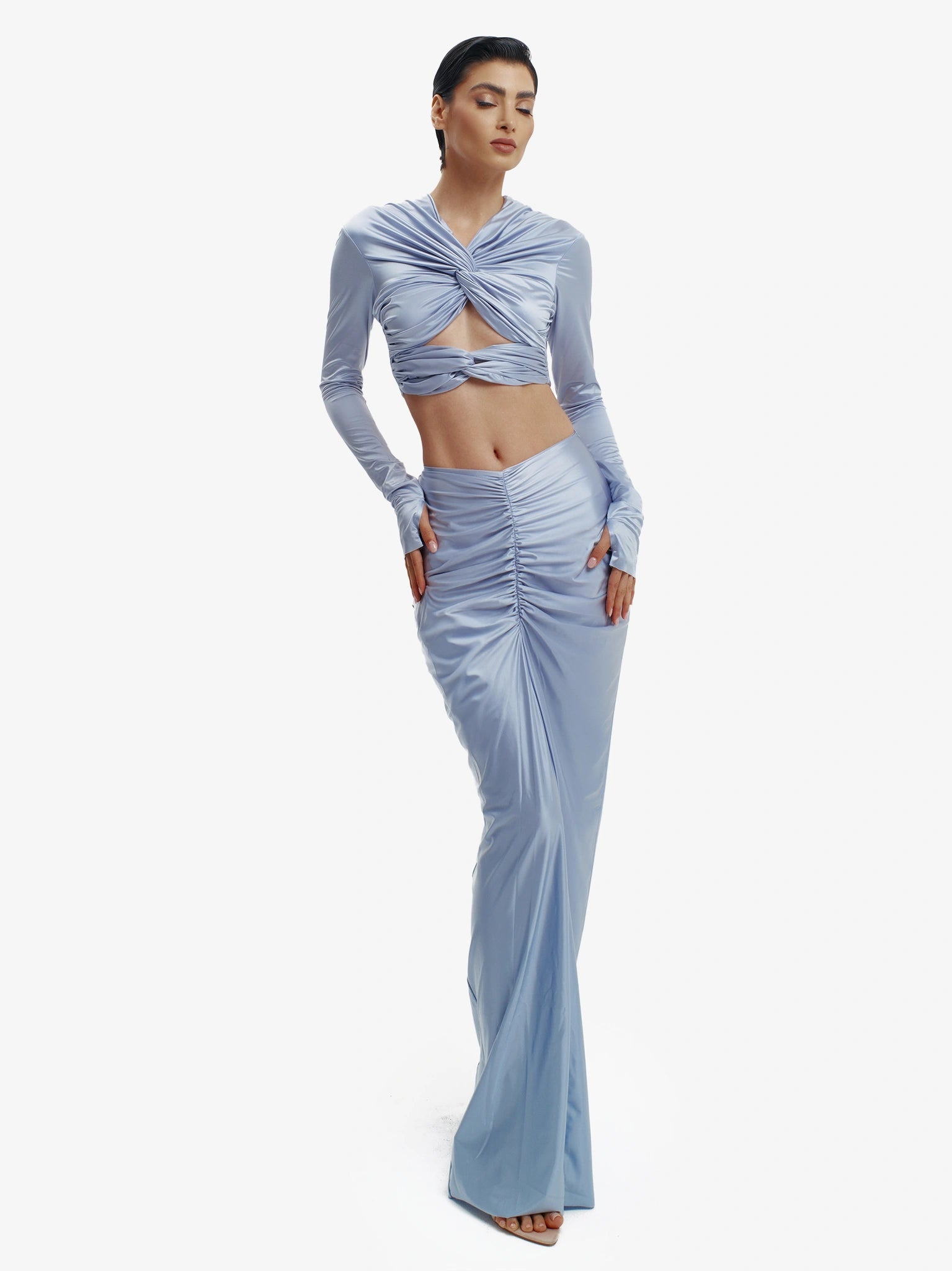 Blue twisted knot maxi skirt, effortless draping, unique minimalist style.