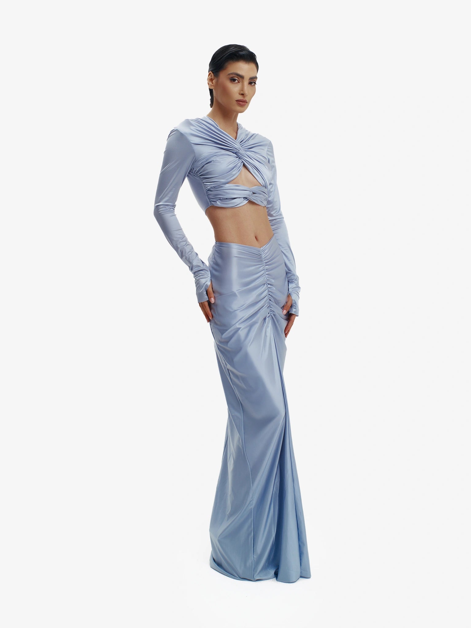 Blue twisted knot maxi skirt, effortless draping, unique minimalist style.
