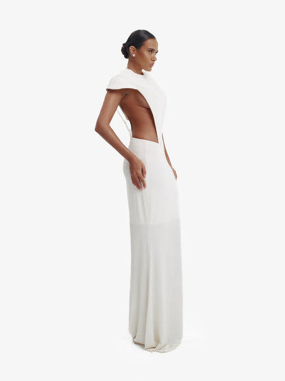 Off White minimalist dress, unexpected side details, efffortless modern chic.