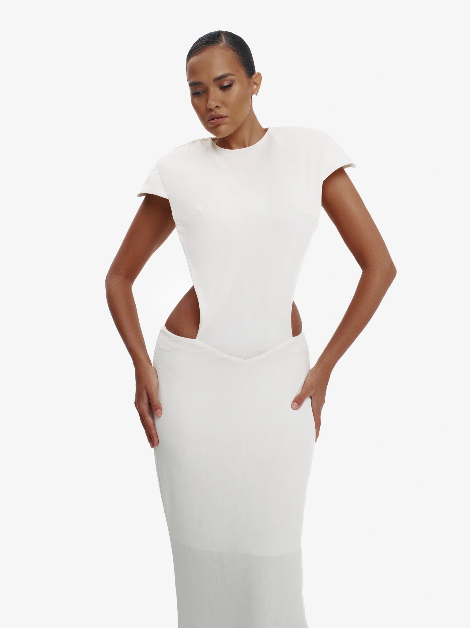 Off White minimalist dress, unexpected side details, efffortless modern chic.