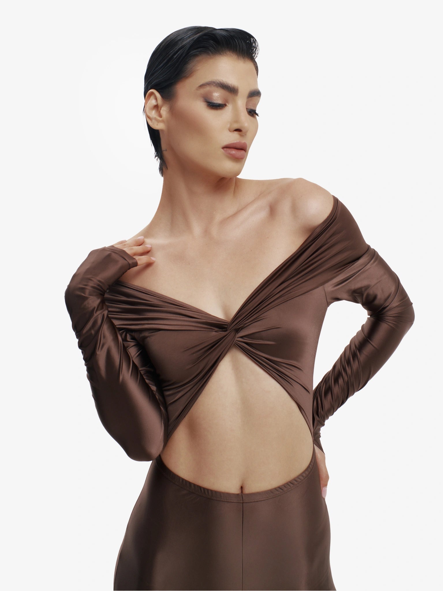 Brown statement jumpsuit, unapologetic style, confident luxury fashion.