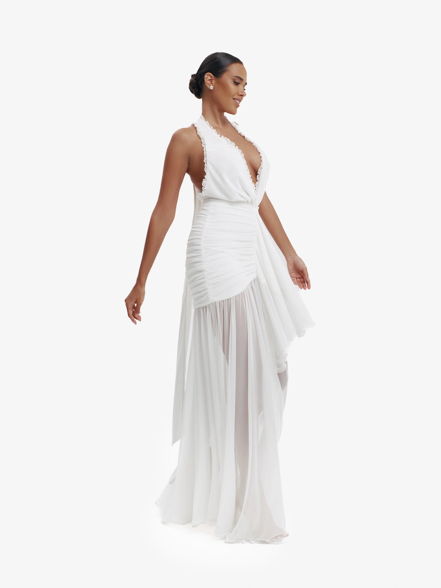 White dramatic mermaid dress, luxe evening wear, confident elegance.