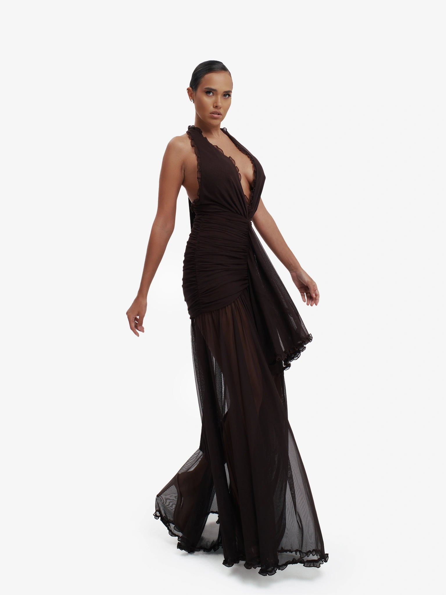 Brown dramatic mermaid dress, luxe evening wear, confident elegance.