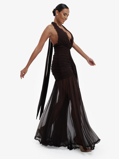 Brown dramatic mermaid dress, luxe evening wear, confident elegance.