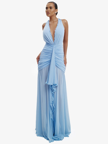 Blue dramatic mermaid dress, luxe evening wear, confident elegance.