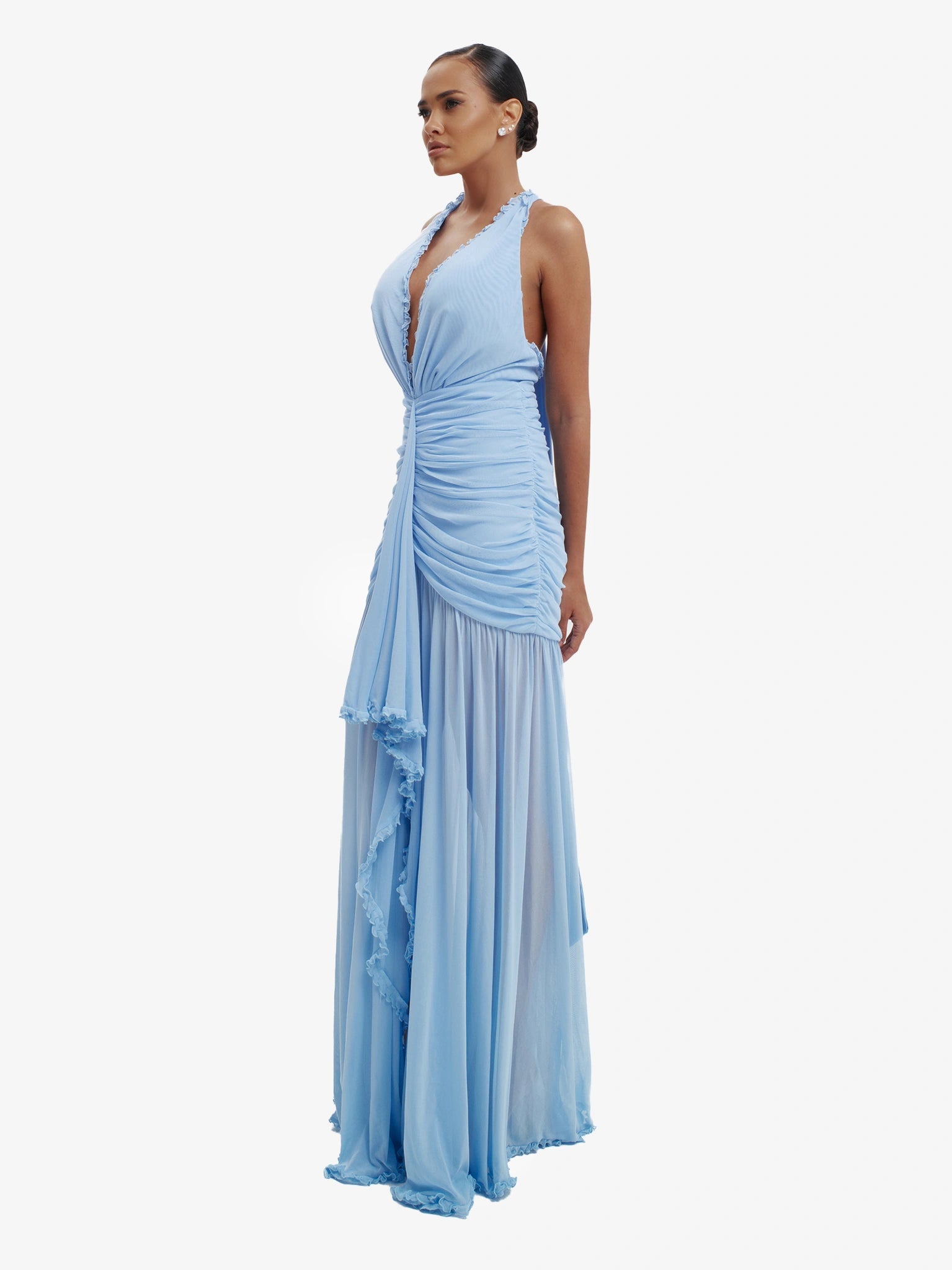 Blue dramatic mermaid dress, luxe evening wear, confident elegance.