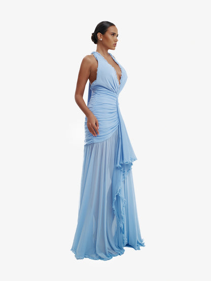 Blue dramatic mermaid dress, luxe evening wear, confident elegance.