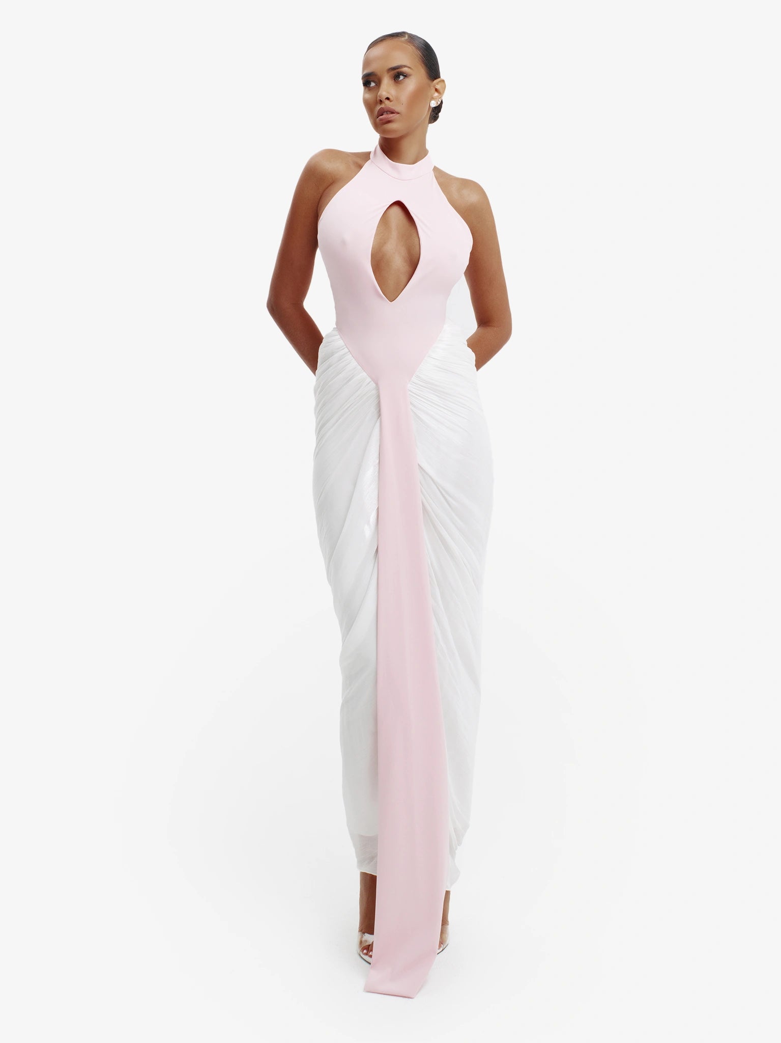 Pink and white daring split-detail top, minimalist elegance, effortless modern chic.