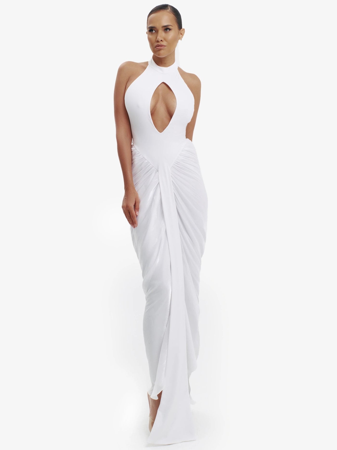 White daring split-detail top, minimalist elegance, effortless modern chic.