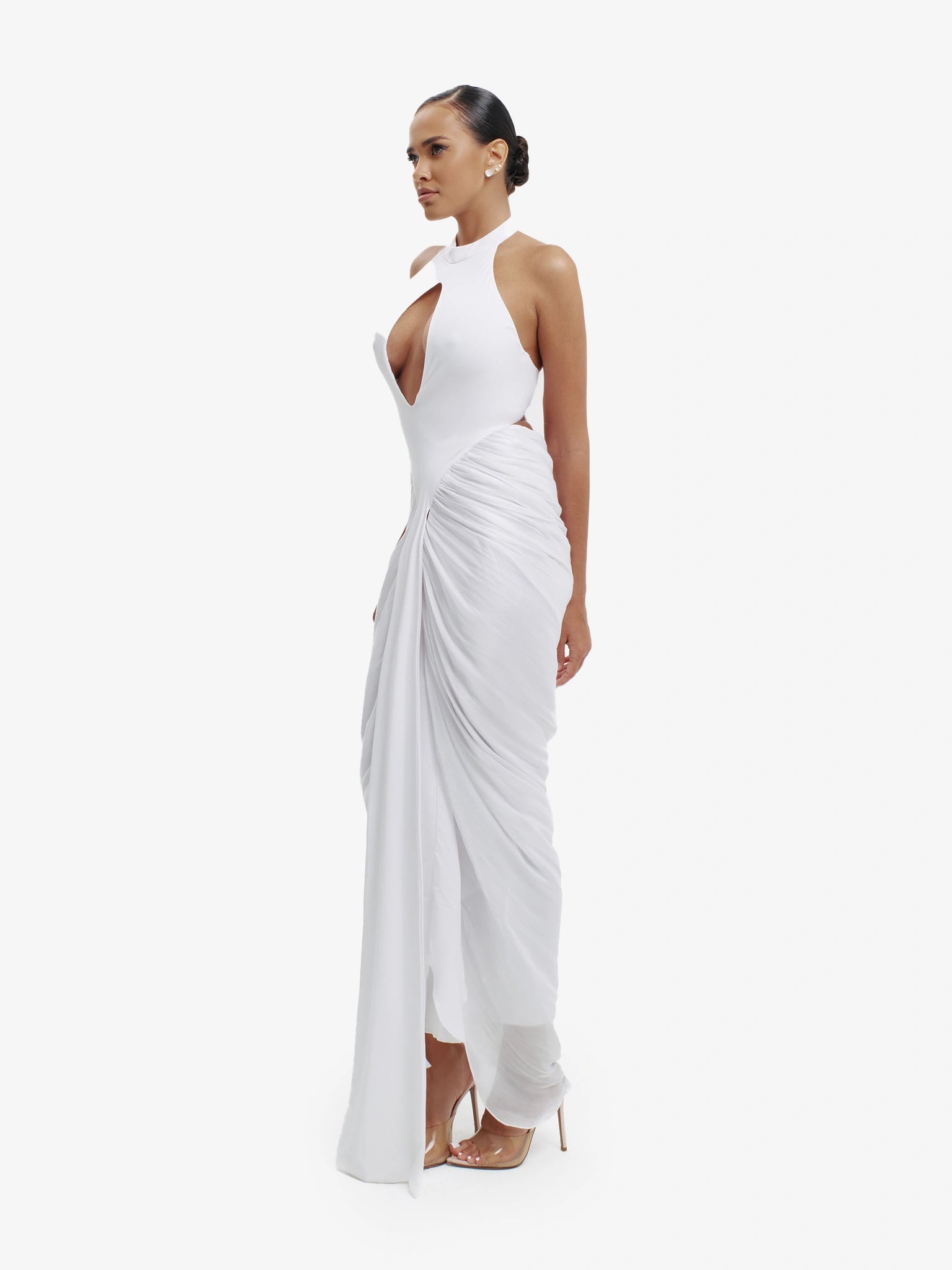 White daring split-detail top, minimalist elegance, effortless modern chic.