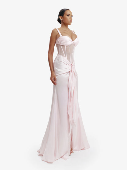Pastel pink statement corset top, luxe structure, unapologetic luxury evening wear.