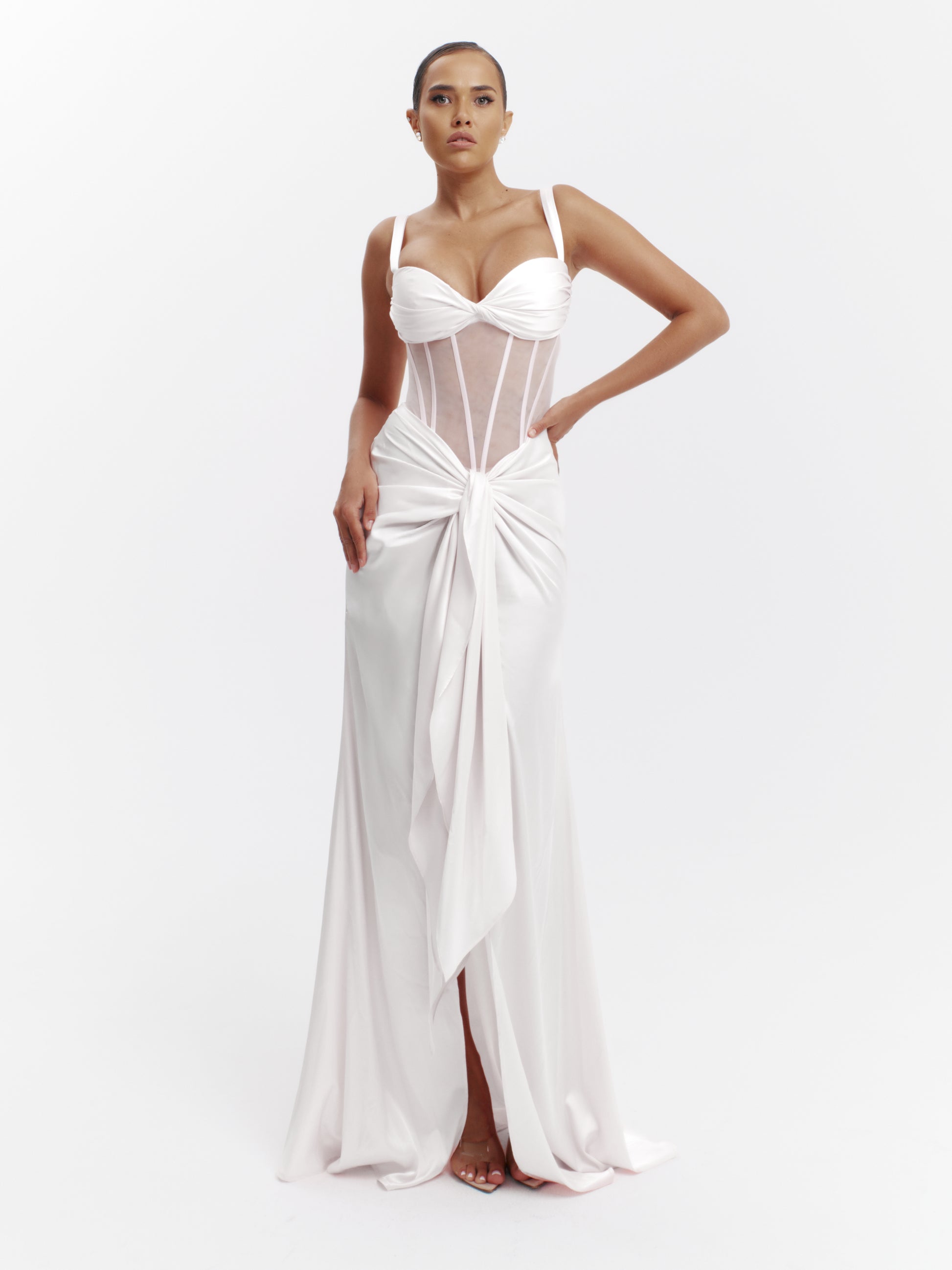 White statement corset top, luxe structure, unapologetic luxury evening wear.