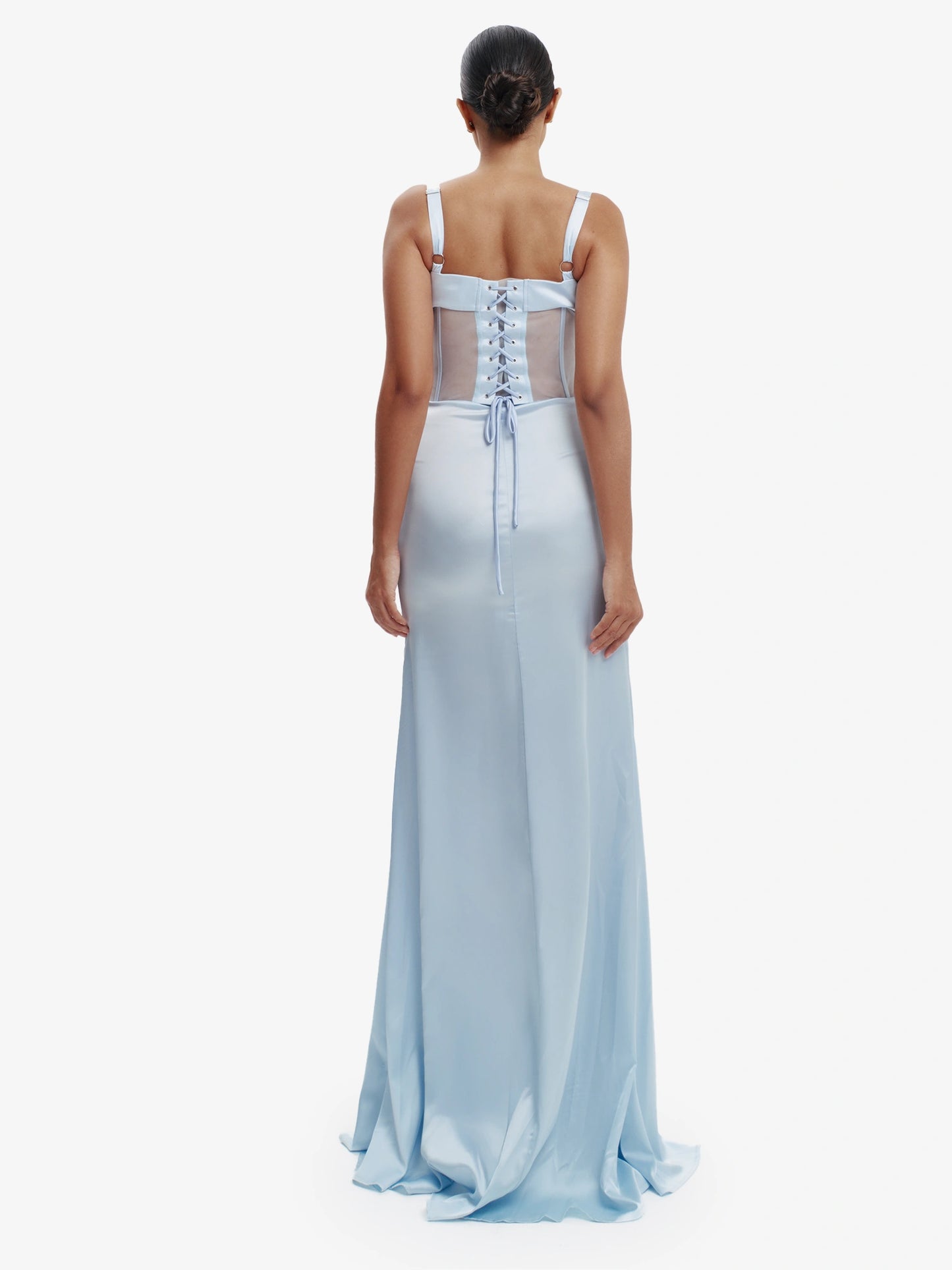 Pastel blue statement corset top, luxe structure, unapologetic luxury evening wear.