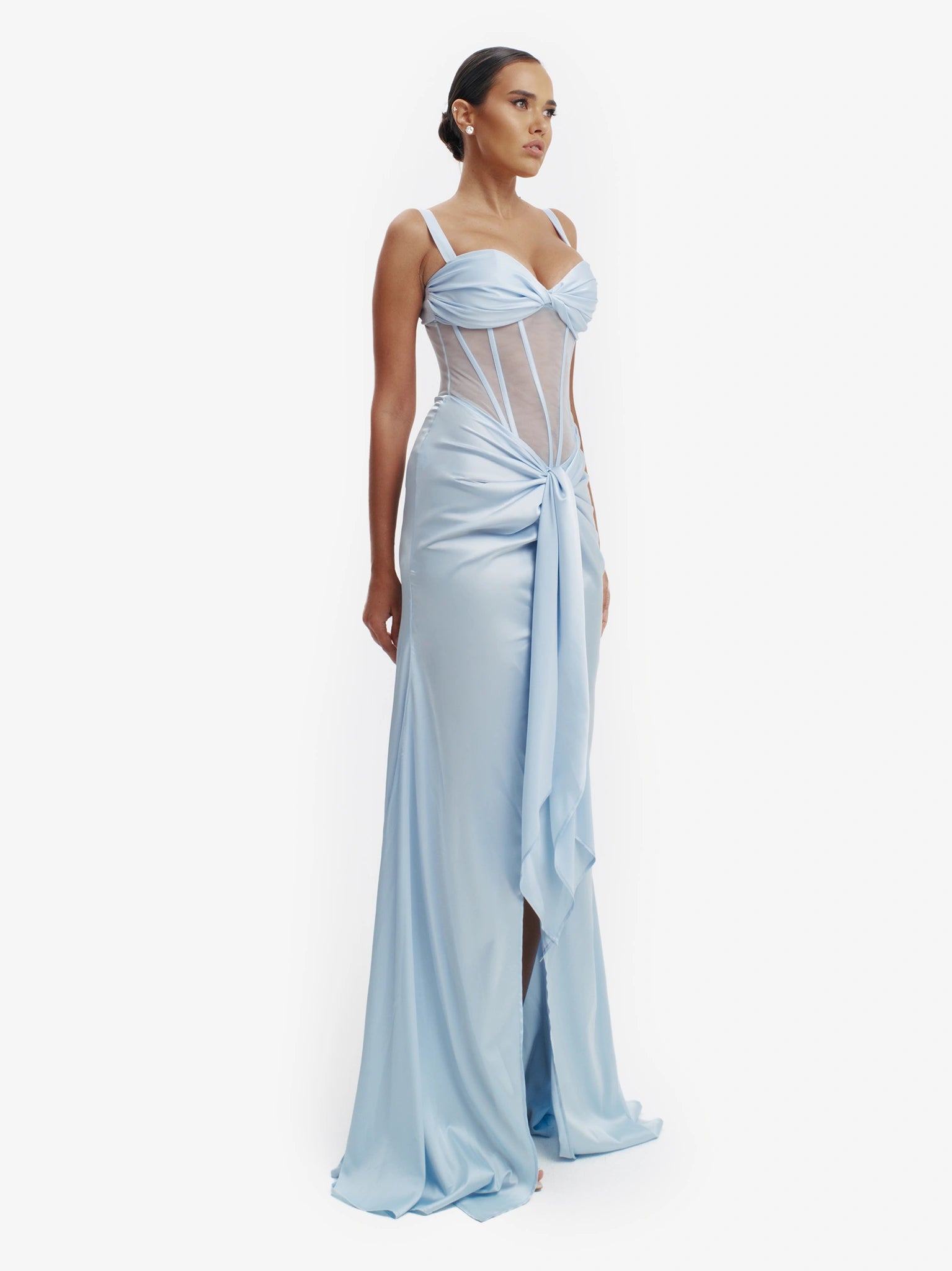Pastel blue statement corset top, luxe structure, unapologetic luxury evening wear.