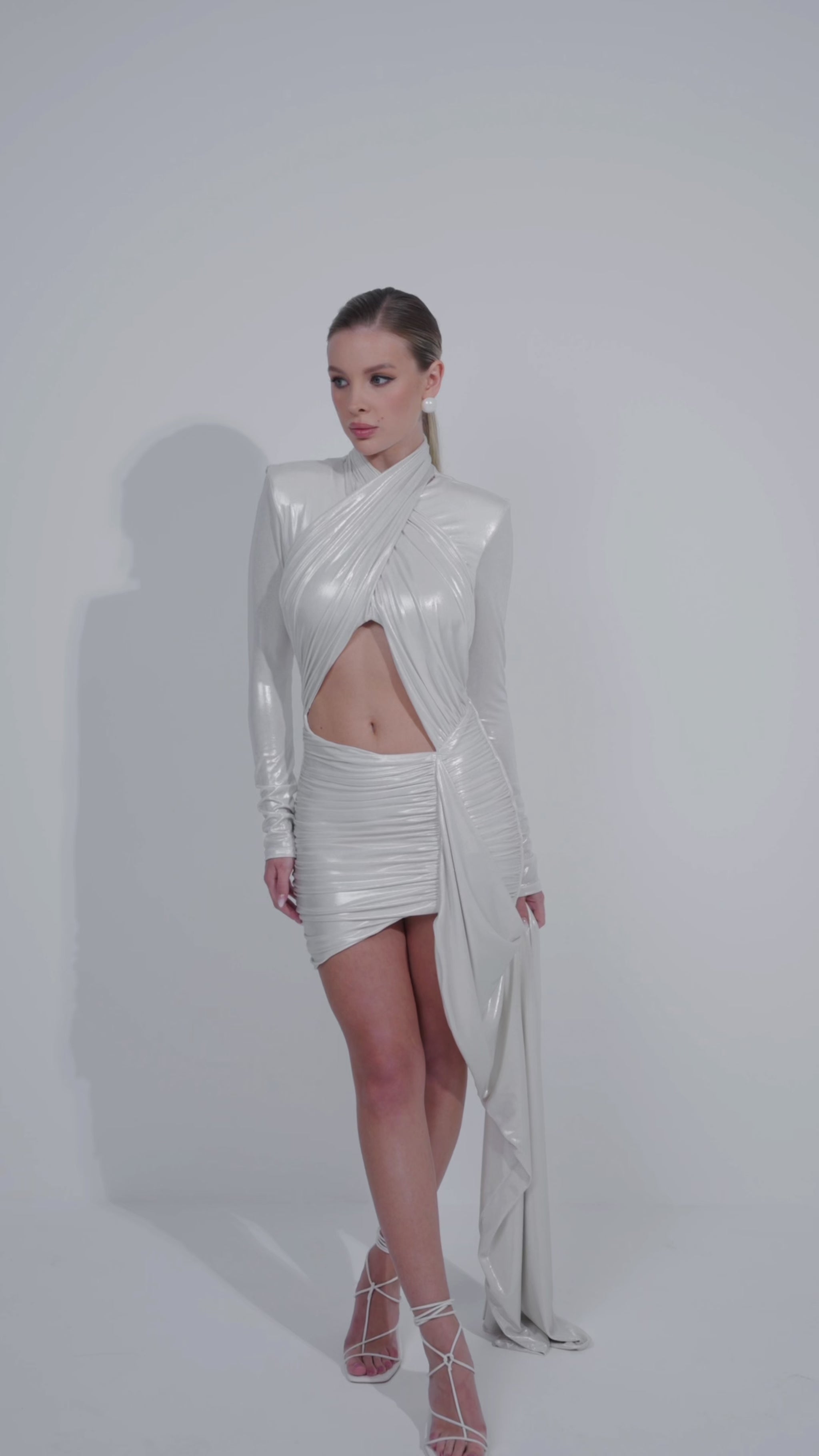 Silver polished metallic dress, daring and unforgettable, luxury party wear.